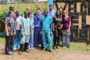 Emory ophthalmologists, including Steven Yeh, and physician-patient Ian Crozier with clinicians at ELWA Hospital in Monrovia, Liberia.