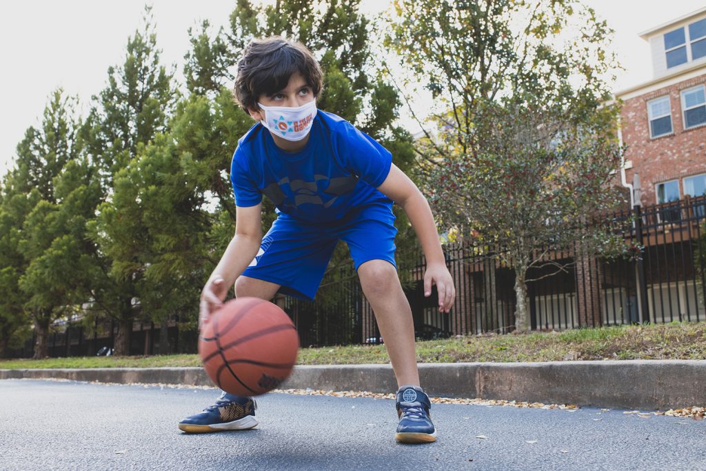 A young basketball player at In the City Camps