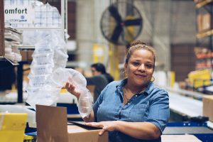 A worker at First Step Warehouse