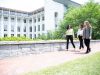 students walking across campus