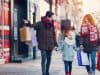 Family with one kid shopping together