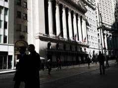 People walk by the New York Stock Exchange (NYSE) in the Financial District on March 07, 2023 in New York City. SPENCER PLATT/GETTY IMAGES