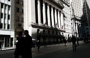 People walk by the New York Stock Exchange (NYSE) in the Financial District on March 07, 2023 in New York City. SPENCER PLATT/GETTY IMAGES