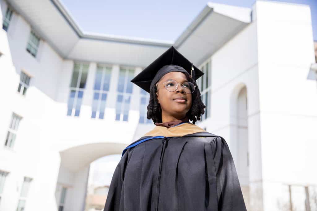 Portrait of Charis Brooks in graduation garb