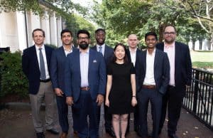 New faculty members standing outside of Goizueta