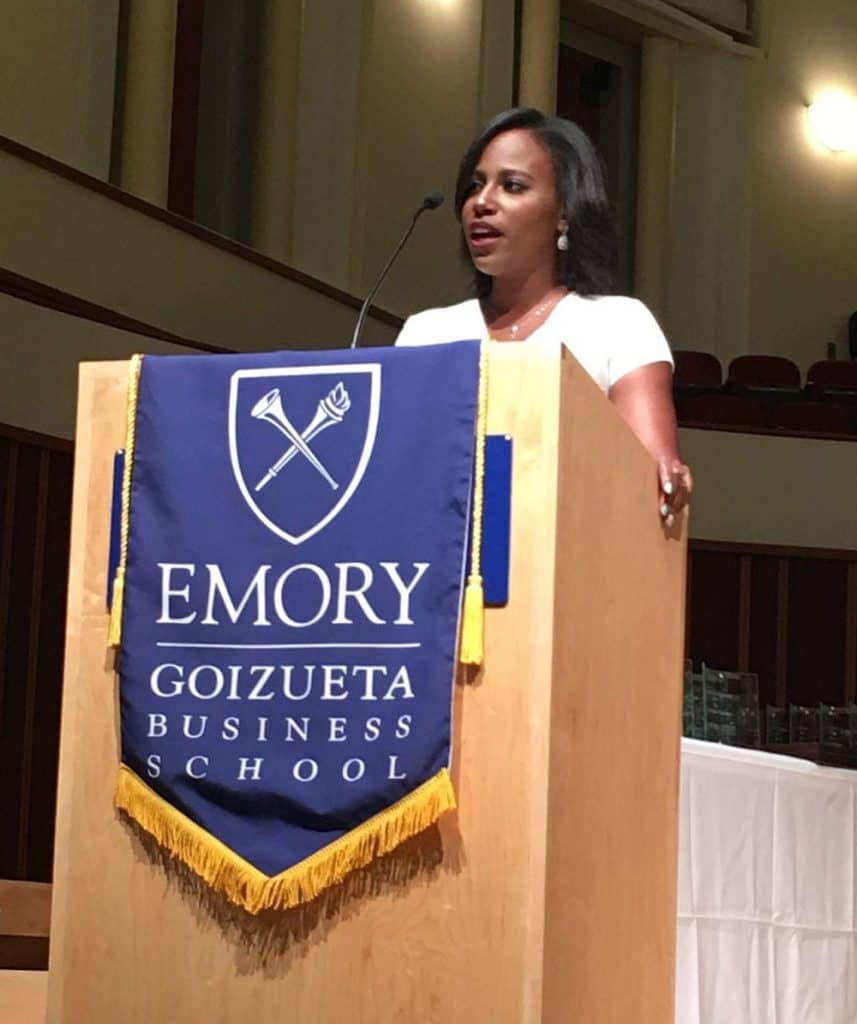 Lauren McGlory speaking at her graduation from Goizueta Business School