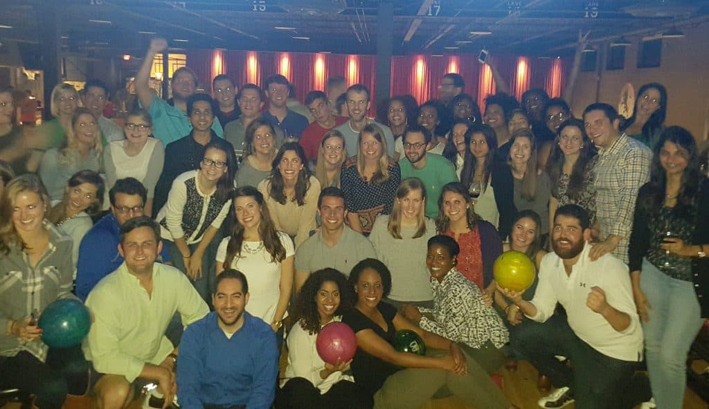 Lauren McGlory and classmates at a bowling event during her time at Goizueta