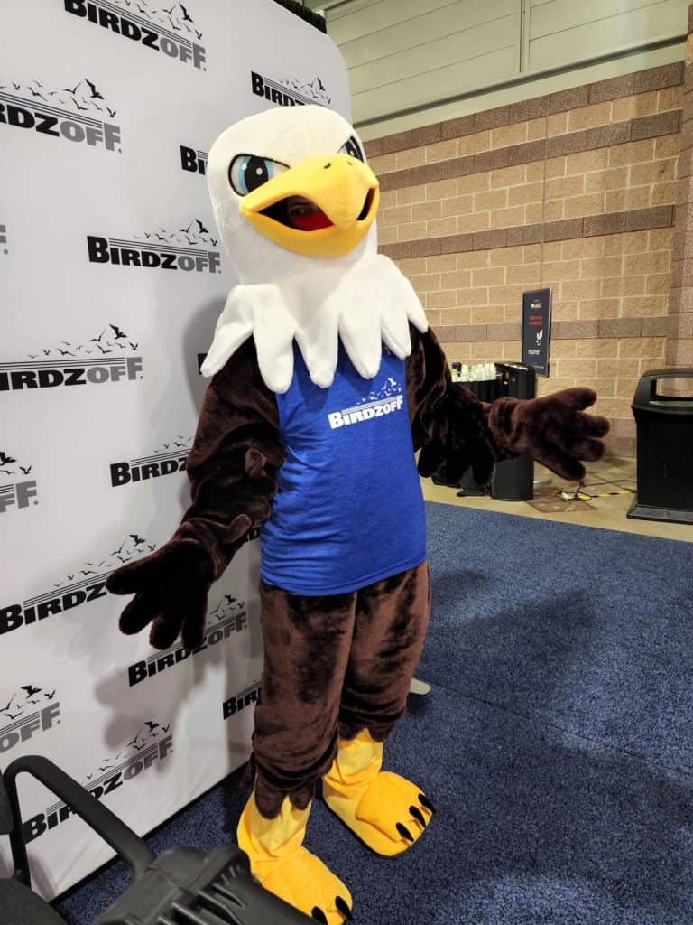 Goizueta's Areanna Sabine poses as the Birdzoff company mascot, Birdie, at a trade show