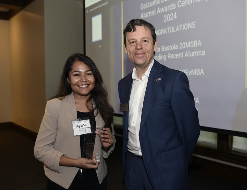 Dipeeka Bastola 20MSBA, 2024 winner of the Outstanding Recent Alumna Award, with Dean Gareth James