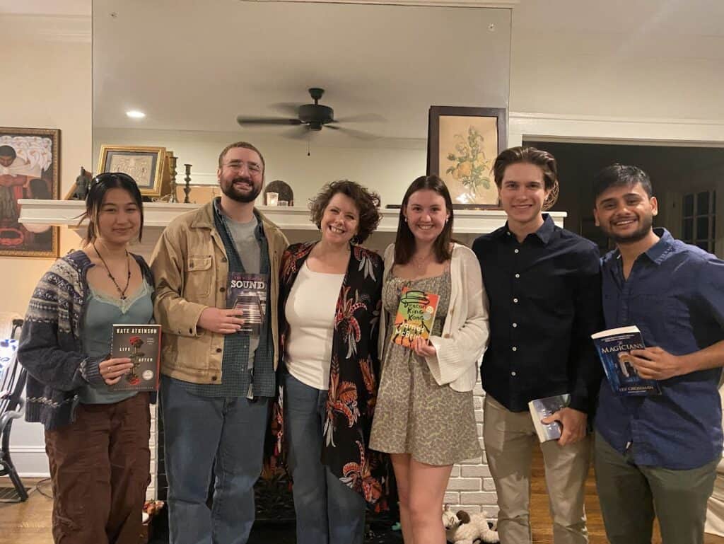 Goizueta Scholars from the Class of 2023 proudly display their books, each hand-selected by Egnor.