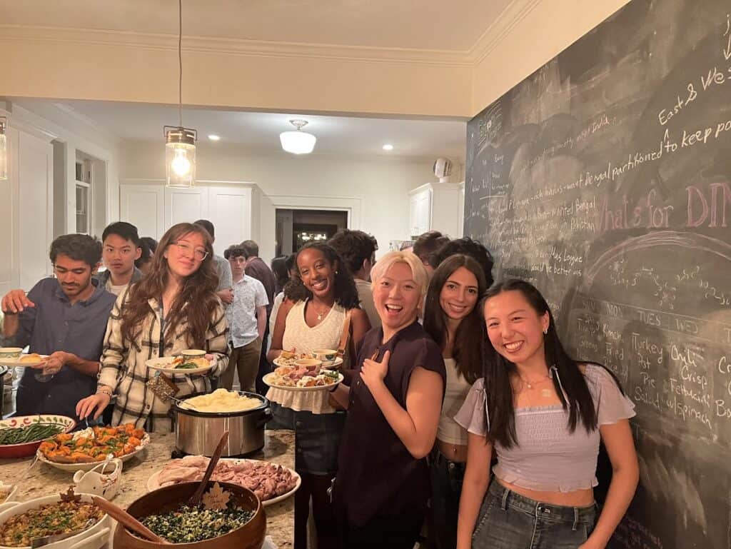 Goizueta Scholars gather in Egnor's kitchen to enjoy her famous home-cooked Thanksgiving meal.