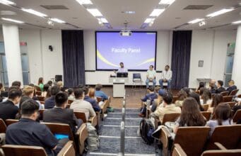 Ramnath Chellappa, Academic Director of Goizueta's MS in Business Analytics program, welcomes students during an orientation event