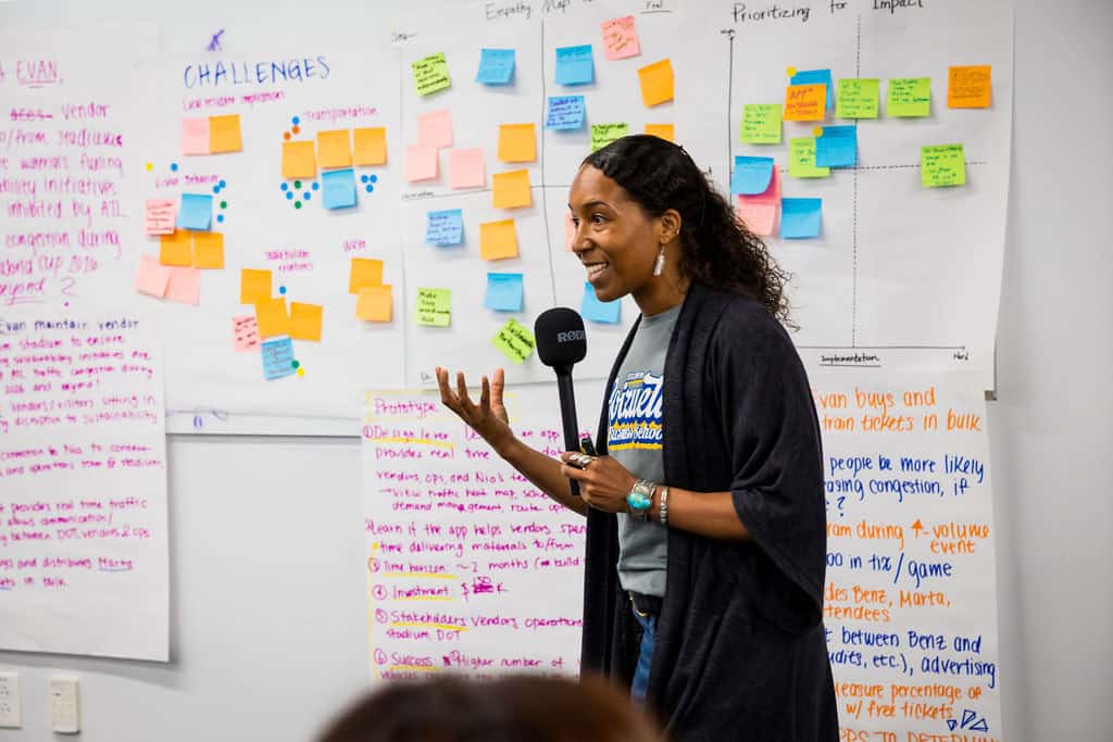 Jasmine (Jaz) Burton leads a human-centered design activity during the Climate Design Challenge.
