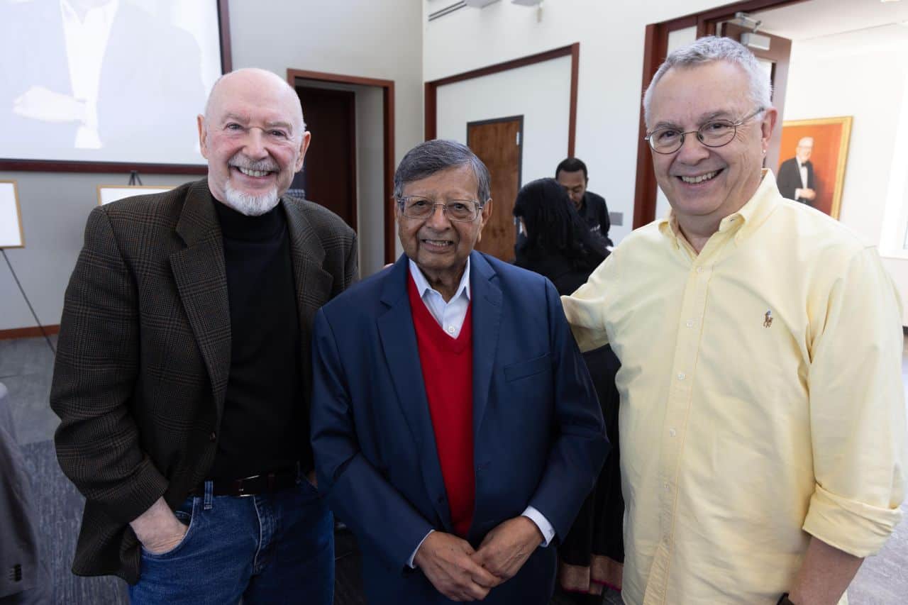 Professor Jagdish Sheth stands with fellow Goizueta retirees Michael Prietula and Ron Harris.
