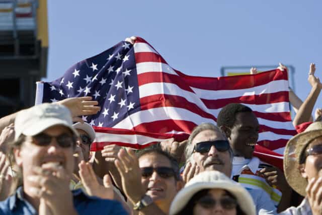 Stadium crowd waving flag